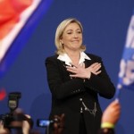 Marine Le Pen celebrates at a Front National rally after the presidential election first round